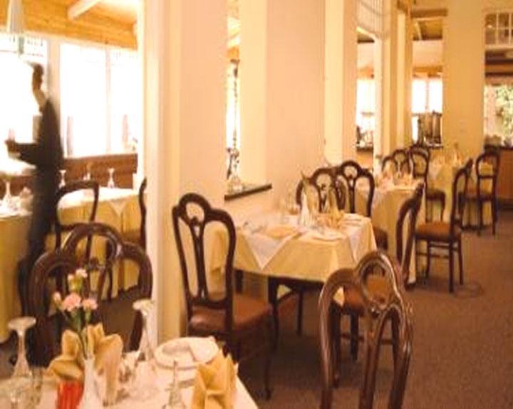 Sentinel Luxury Suite Hotel Претория Ресторан фото